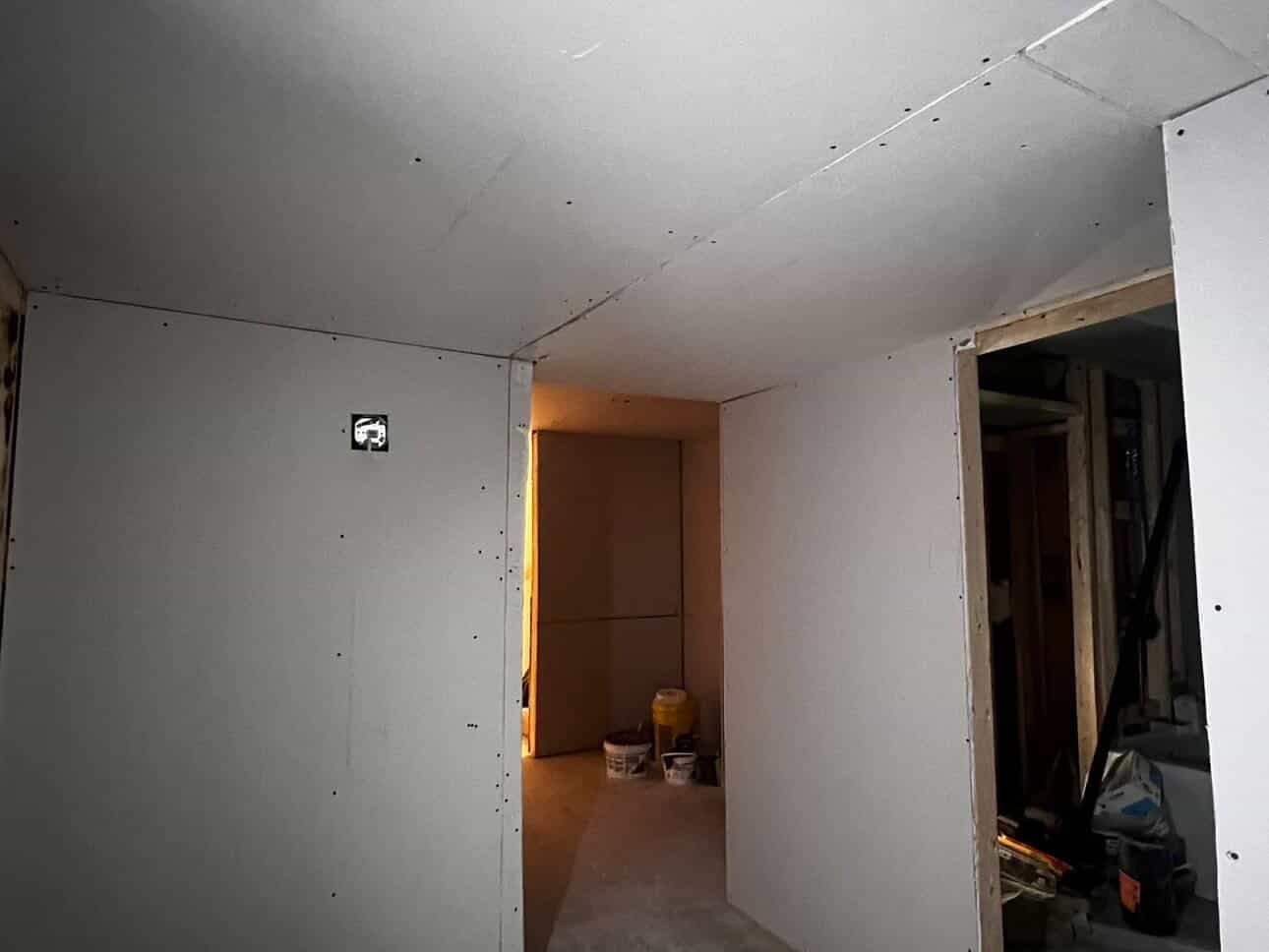 Drywall installation on walls and ceiling