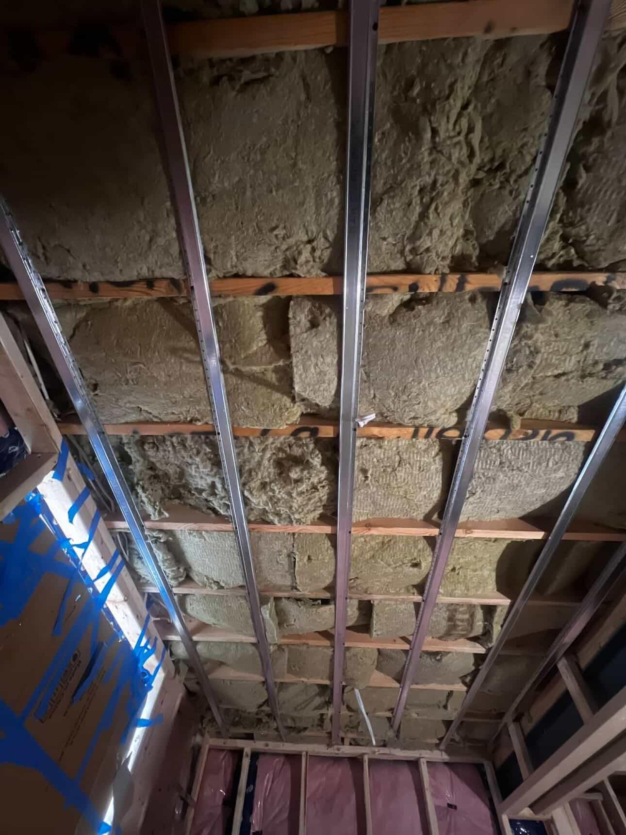 Spray foam insulation on ceiling joists